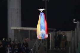 “Флаг Арцаха во время игры фейкового Гарабаха”  – First Armenian Front